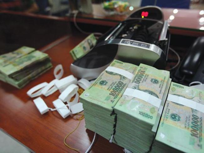 Lãi suất tiết kiệm năm 2015 sẽ giảm đến mức nào?